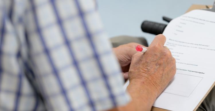 Man completing a survey