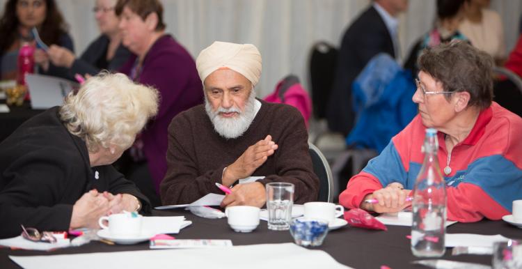 People talking around table