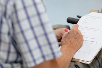 Man completing a survey